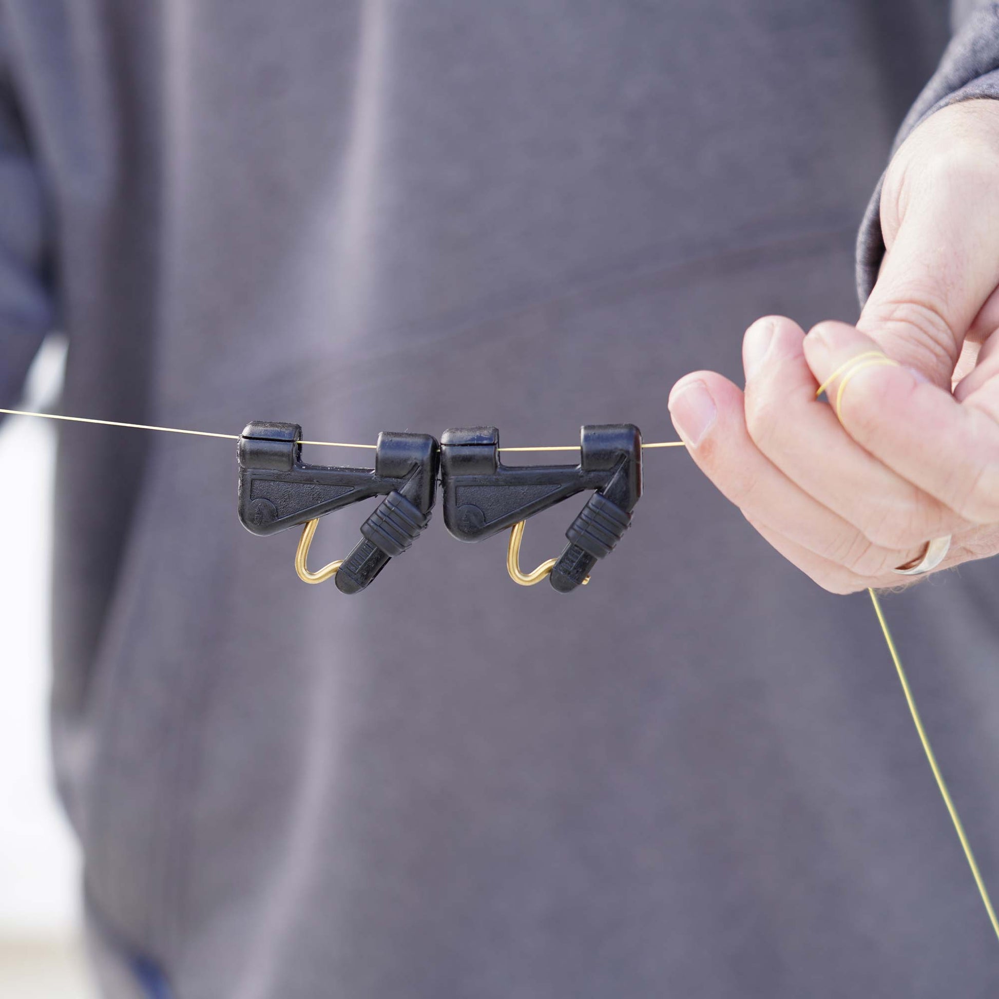 AFTCO Goldfinger Outrigger Clip Black