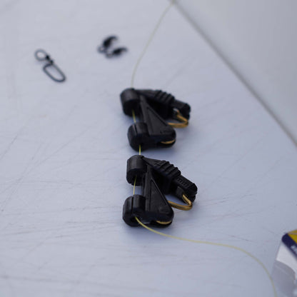AFTCO Goldfinger Outrigger Clip Black